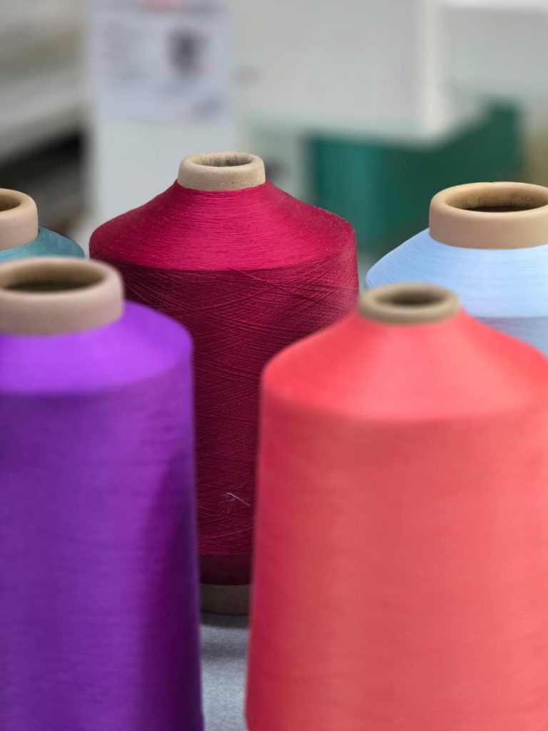 Premium woven clothing labels with different thread counts including damask, satin, and taffeta labels for UAE fashion brands